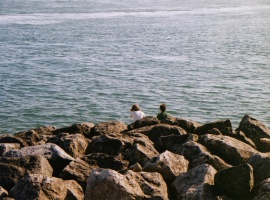 stuck between a rock and a wet place